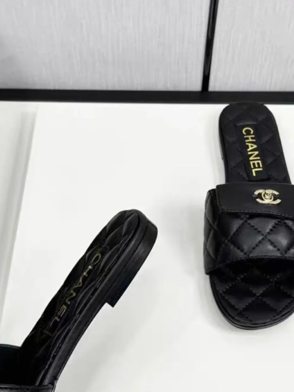 Chanel Black Quilted Lambskin CC Turn‑Lock Flat Slide Sandals